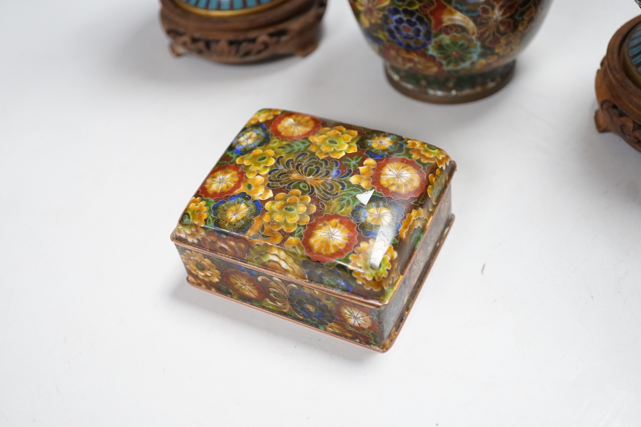 A pair of Chinese cloisonné enamel vases, another vase and a box
